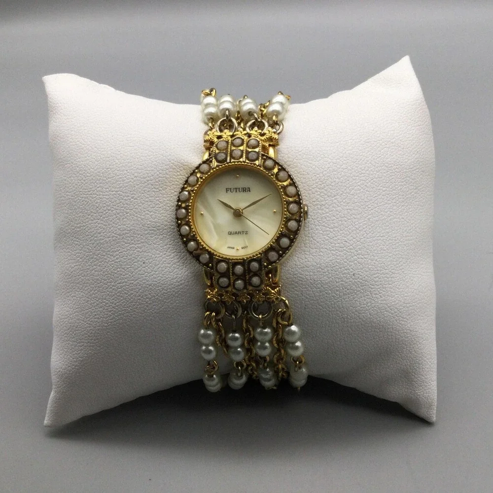 Futura Womens Watch 25mm MOP Dial Gold Tone Faux Pearl 3216 New Battery 6.75
